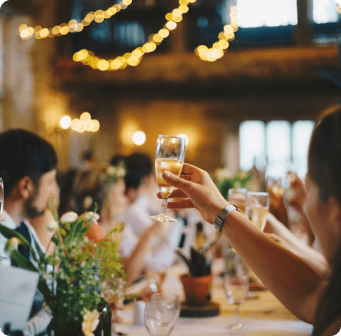 A man toasting with a wine glass